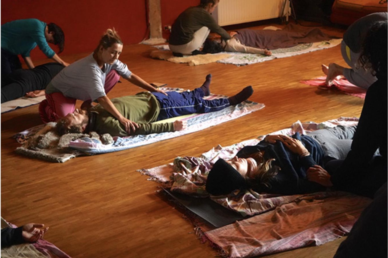 Bodywork session, wooden floor