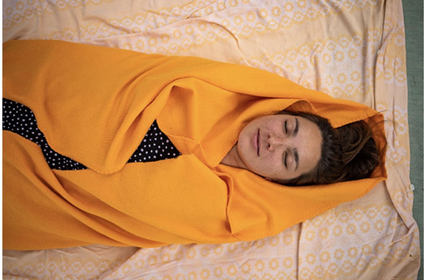 Wrapped in yellow blanket